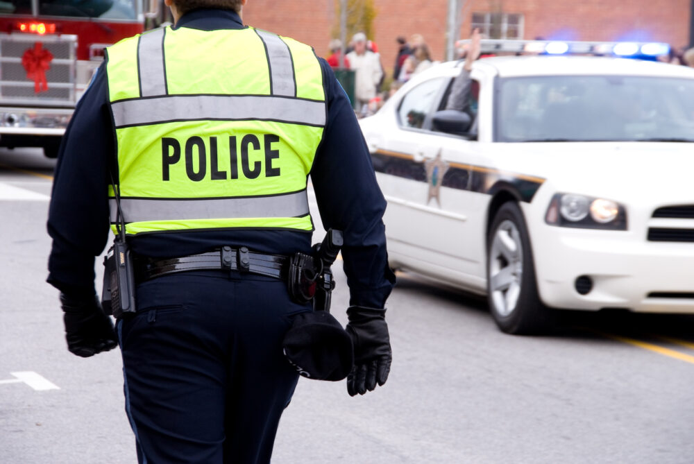 policeman in yellow vest