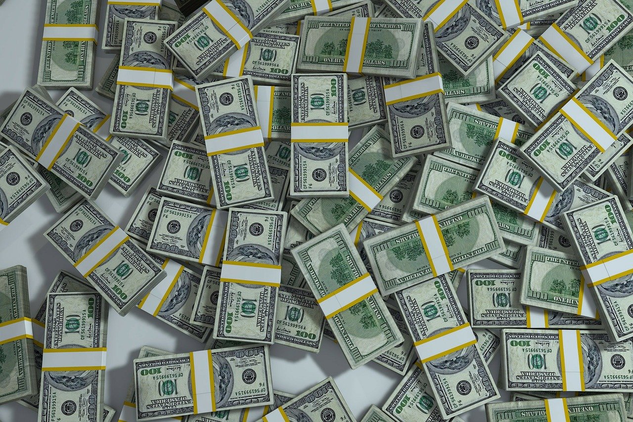 pile of dollar bills