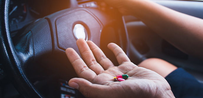 Hand of Man takes drugs in the car