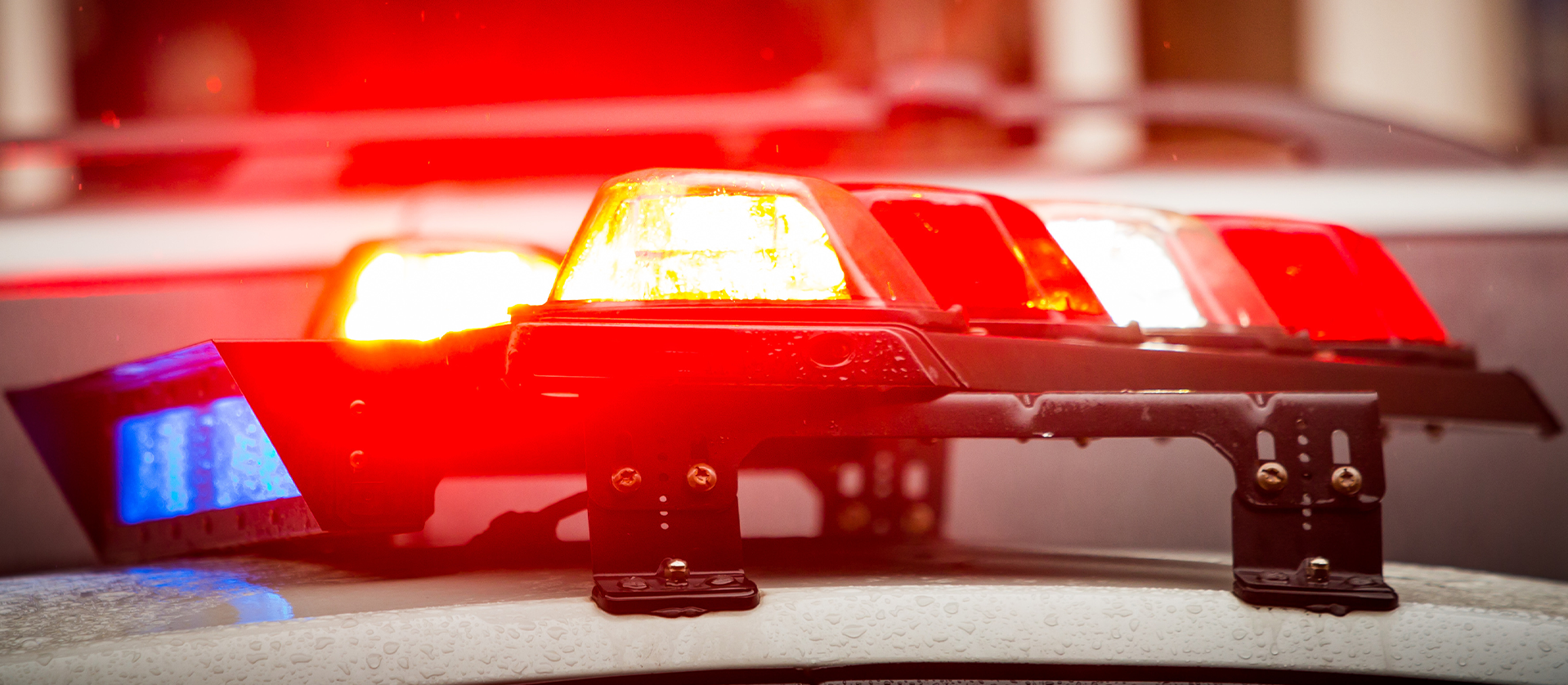 Police emergency lights on a NYS police car; Rockland County Traffic Violation Attorney concept image