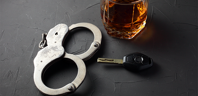 handcuffs and alcohol