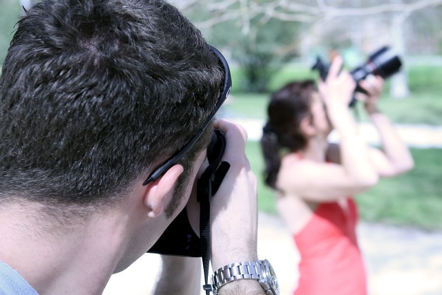 man stalking woman with camera