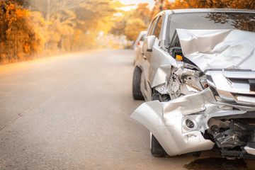damaged car on road