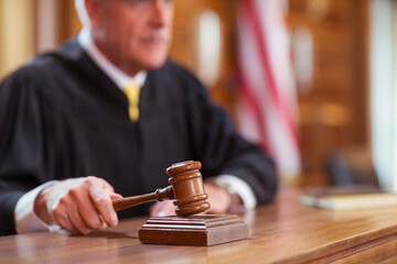 judge banging gavel in a court; Ramapo DUI Defense & Criminal Attorney concept image
