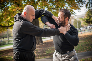 two man assault each other