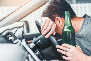 man with beer in car dui